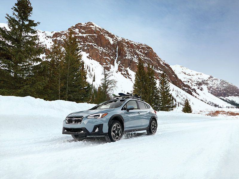 A Subaru Crosstrek in the snow.